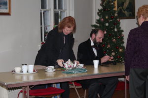 Liz and Gerald at the signing table following the performance